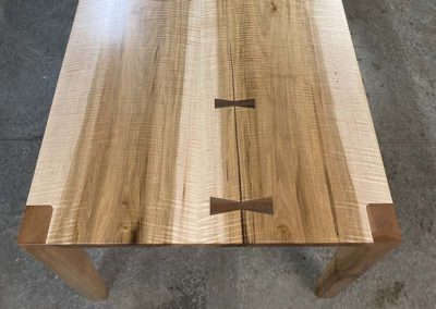 Custom Wood Bow Ties On Curly Maple Tabletop