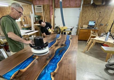 Polishing Custom Wood And Blue Epoxy Table